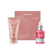Tre hudvårdsprodukter för återfuktning elasticitet och mot mörka fläckar, inklusive Medicube Collagen Night Wrapping Mask, Biodance Bio Collagen Real Deep Mask och Anua Niacinamide 10+ TXA Serum i en vit bakgrund.