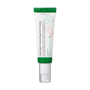 AXIS-Y - Dark Spot Correcting Glow Serum på en vit bakgrund.